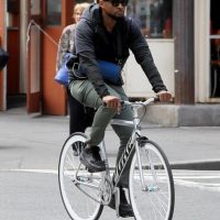 Usher Riding his bike 