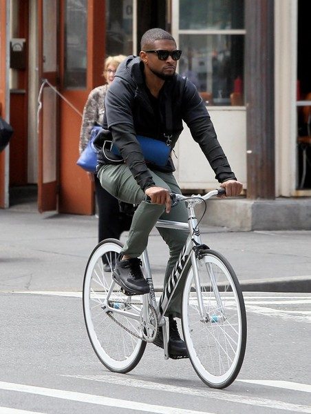 Usher Riding his bike